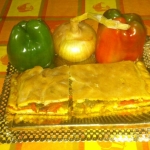 EMPANADA DE PIMIENTOS Y CEBOLLA.